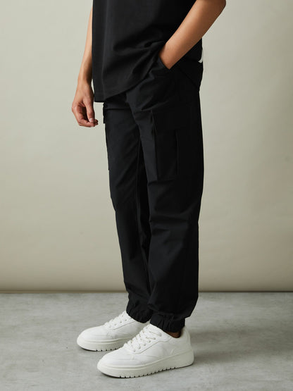 Reiss 3-9 yrs Technical Drawstring Trousers in Black