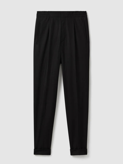 Reiss Relaxed-Fit Pleated Tapered Trousers in Black