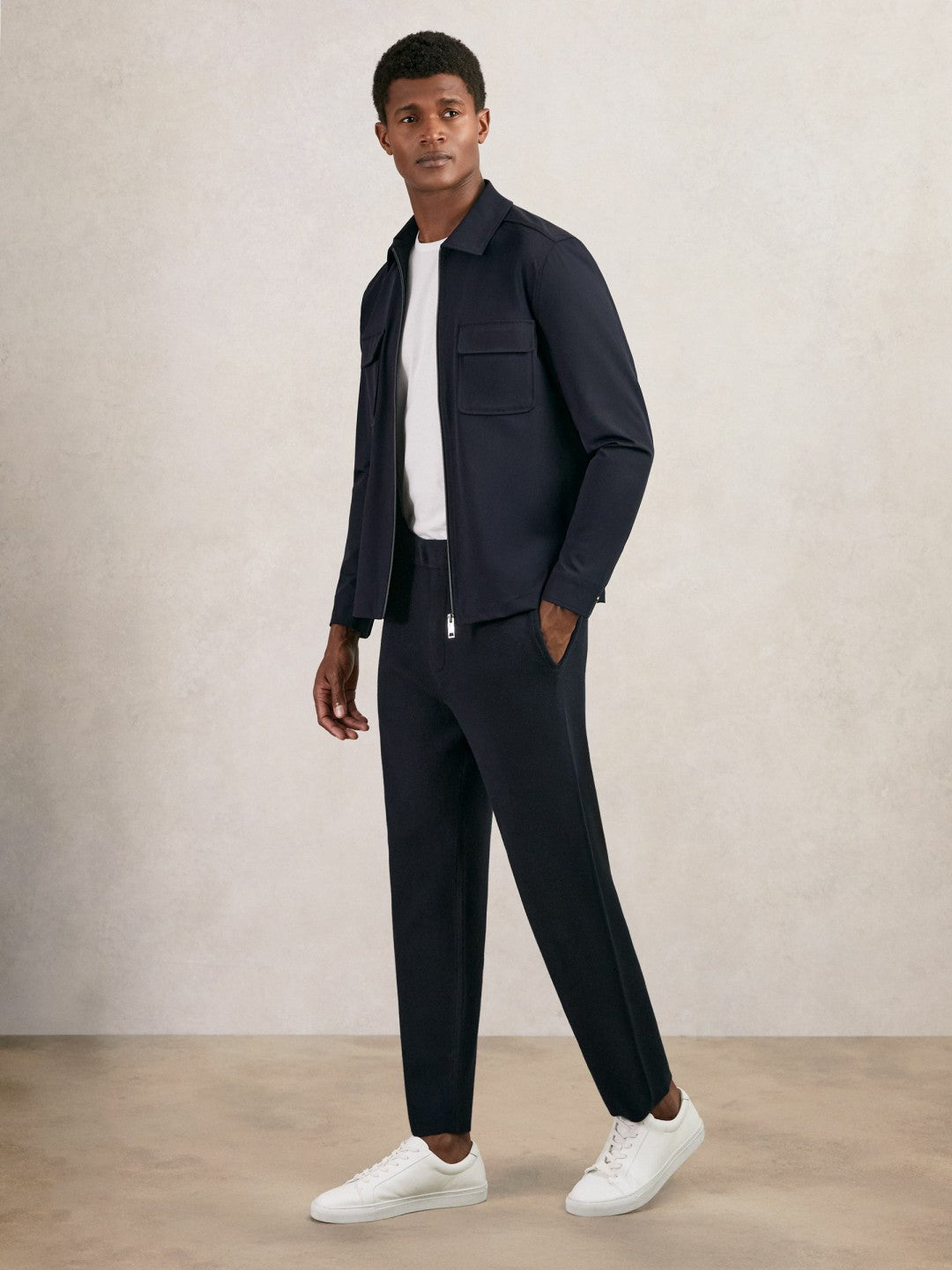 Reiss Tapered Knitted Trousers in Navy