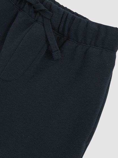 Reiss Cotton-Blend Textured Cuffed Joggers in Navy