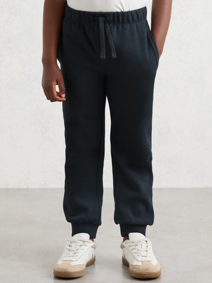 Reiss Cotton-Blend Textured Cuffed Joggers in Navy
